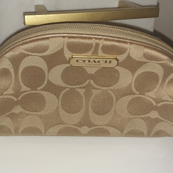 Coach Handbags - Nwt Coach mini cosmetic bag wallet clutch gold
